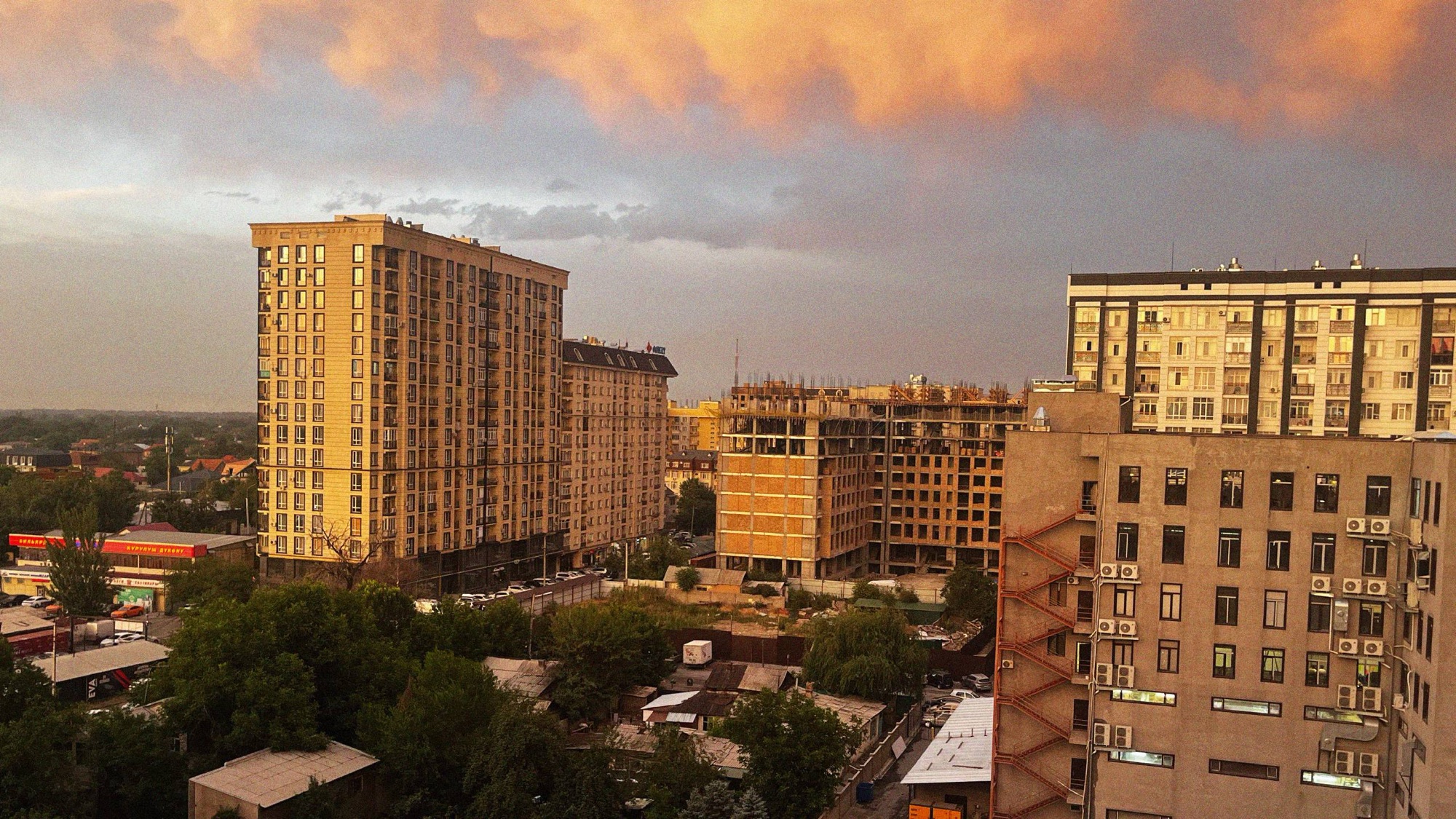 A view looking east across Frunze Street. Much of the city still feels under construction, with new residential apartments springing up, albeit with seemingly little urgency applied in actually completing them.