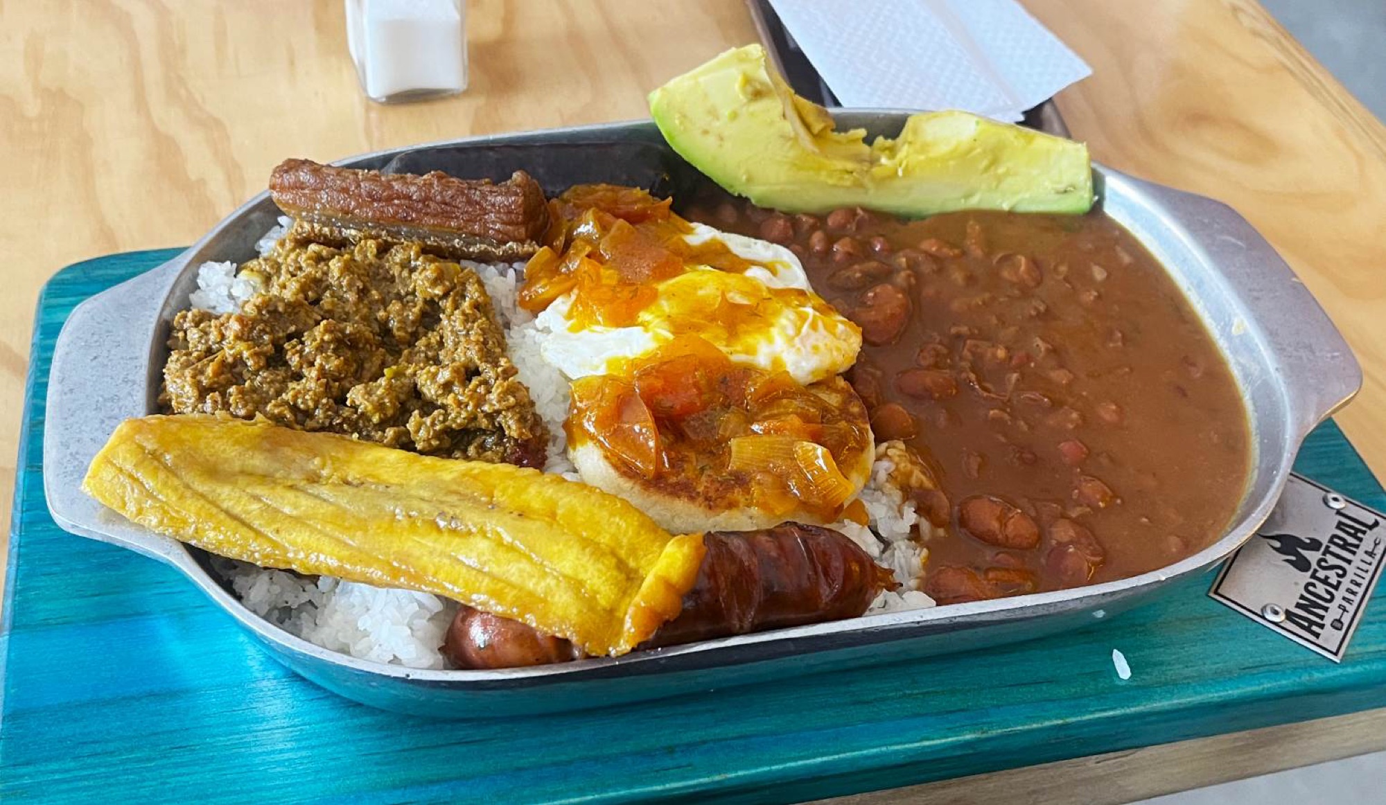 Reminiscent of a full English breakfast in terms of size and scope, the 'bandeja paisa' is surely a contender for the world's most filling meal. Consisting of rice, beans, ground beef, chicharrón, fried egg, plantain, avocado, arepa, chorizo and morcilla, one should arrive with an empty stomach.