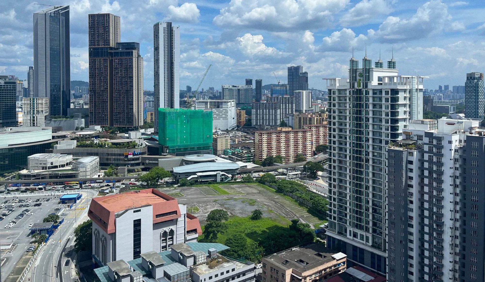 Looking towards Pudu from The Robertson in Bukit Bintang. Vast expanses of undeveloped land dot central areas and contribute to a dormant feeling throughout much of the city center.