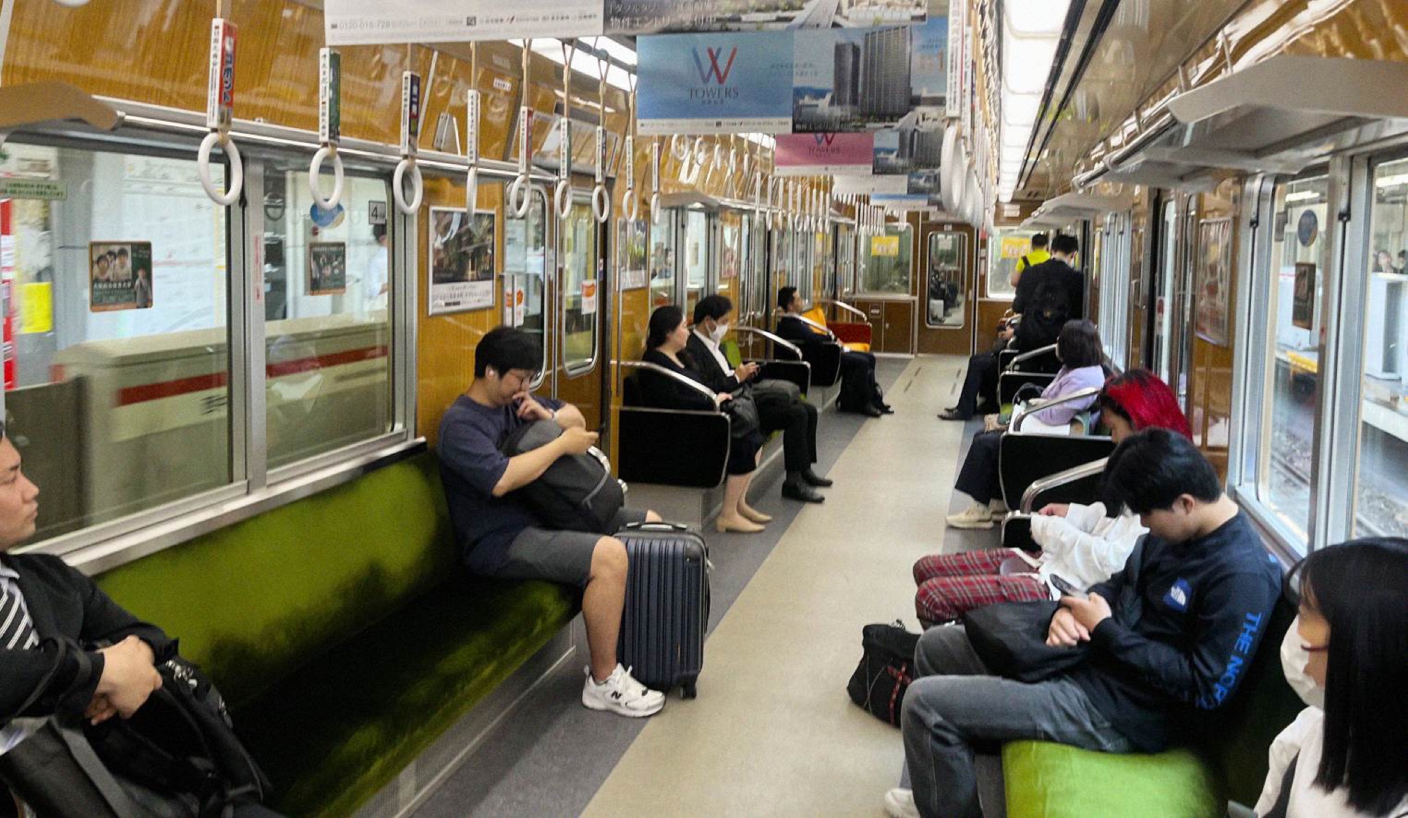The wooden veneered cars of the metro service give some cars a nostalgic feel, far removed from the hi-tech sophistication Japan is renowned for.