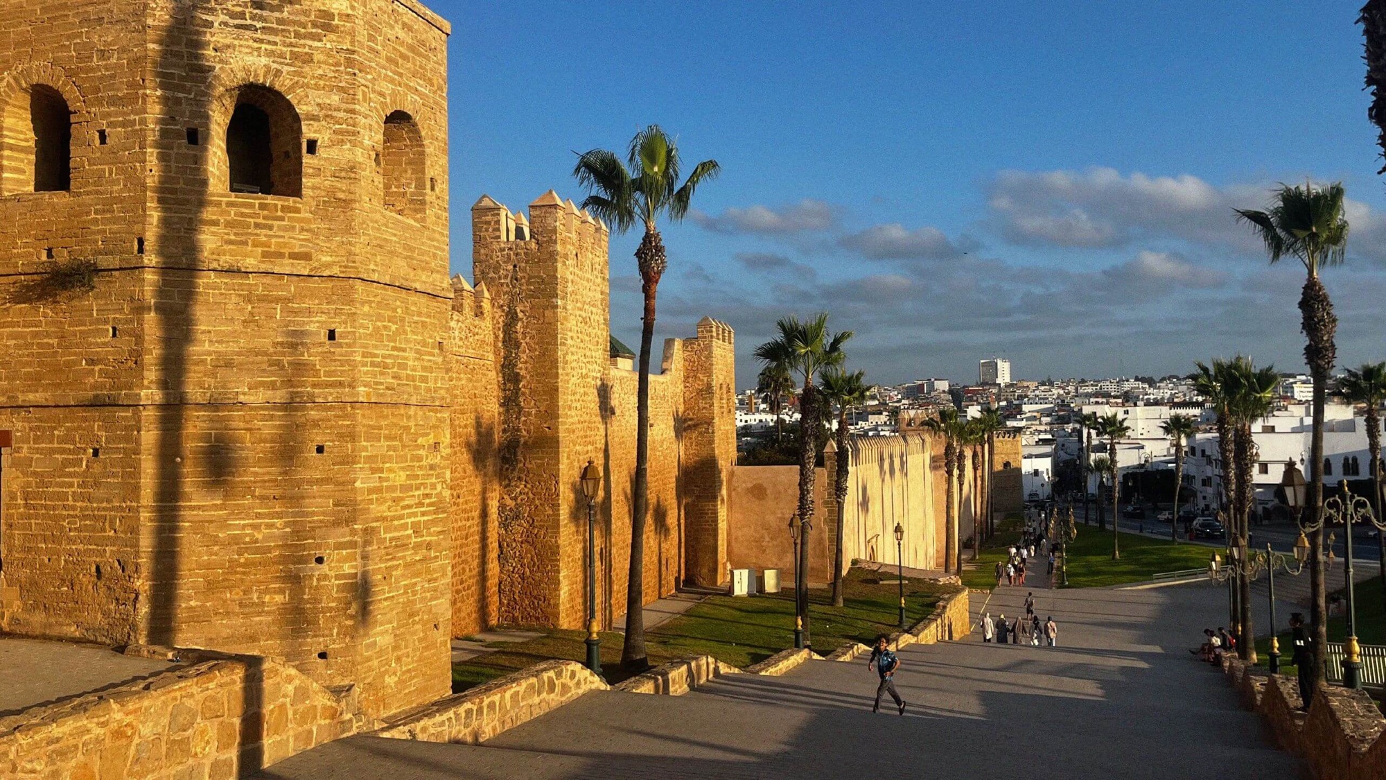 If you walk out of the Old Market towards the Andalusian Gardens, it's worth continuing up to wander within the more polished streets of the Kasbah des Oudayas, which hugs the rock face as the river exits the city. Inside, there are plenty of refined options for cafés and you can find a number of more upmarket accommodation options, which would make it a more suitable choice to stay in than the Medina itself.