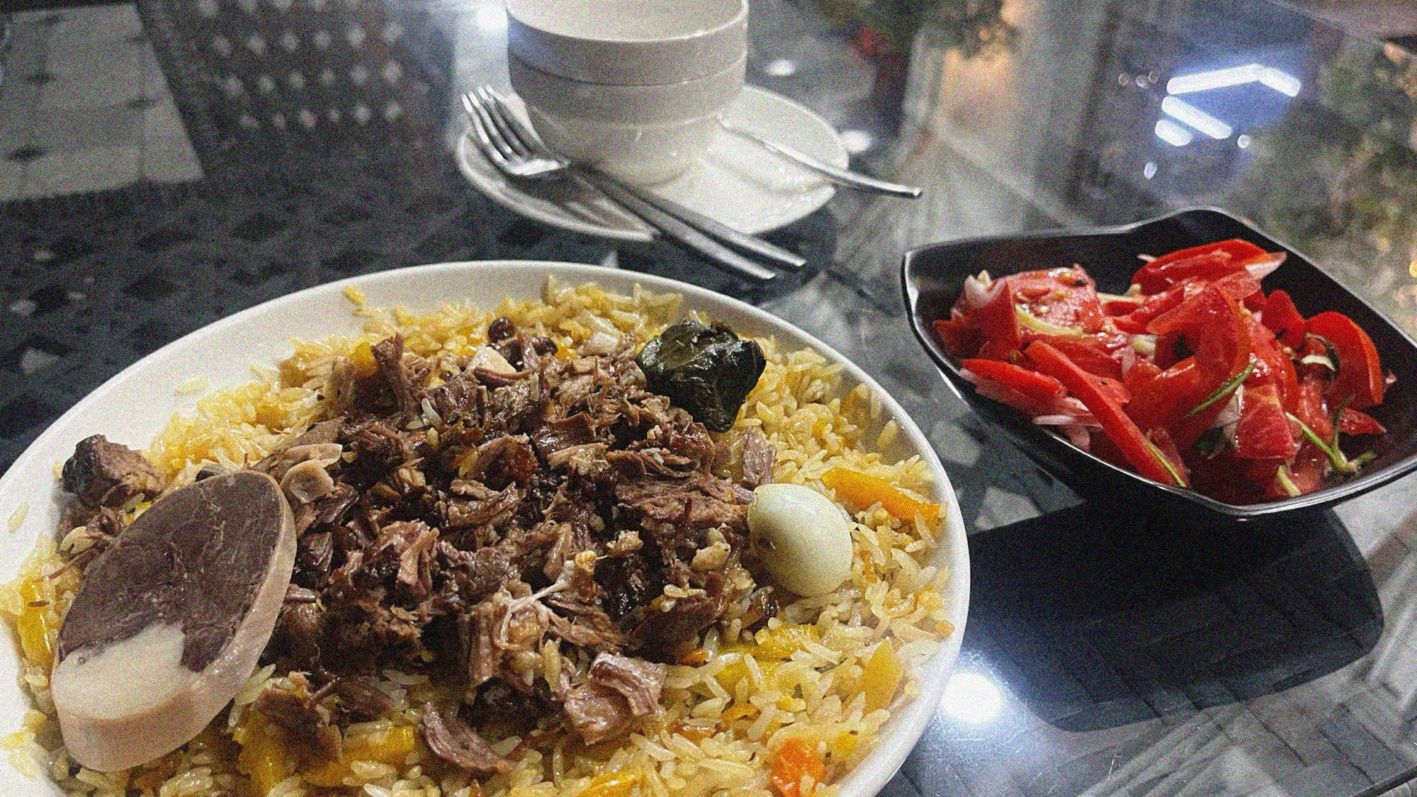 No trip to Uzbekistan would be complete without sampling the national dish, plov. In truth, I couldn't detect any differences between the varieties I sampled elsewhere in the region, but 'Plov City' felt as good a place as any to sample it. Expect oily rice cooked in tail fat, carrots, currants and some lamb or beef placed on top. Unless you are intending on acquiring some serious mass, you should probably avoid daily consumption. If you are wondering what the large circular item is, no its not bone, it's horse.