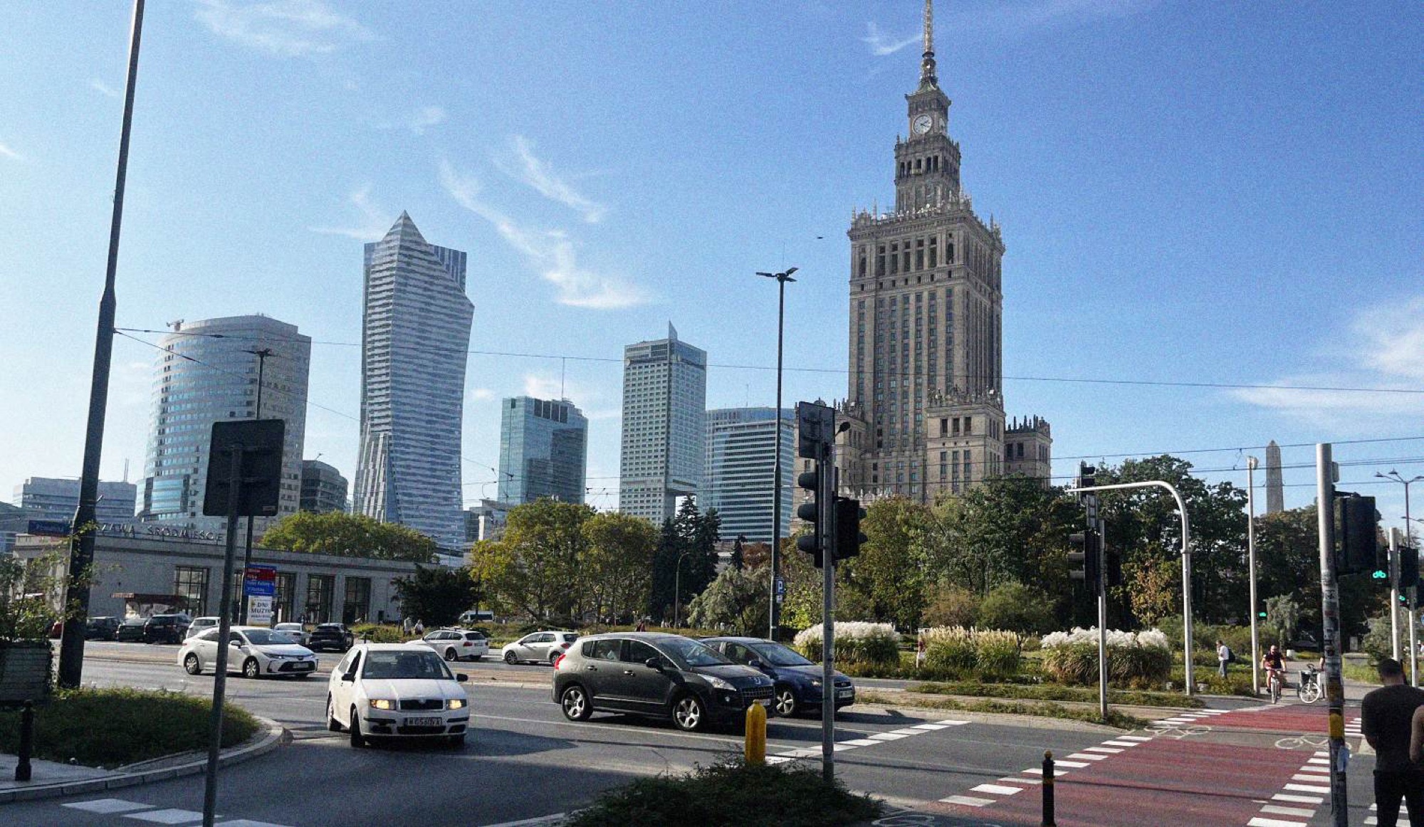 The area surrounding the symbolic Soviet-era 'Pałac Kultury i Nauki' marks what could be considered the geographical centre of the city, with the modern high-rise skyline of Mirów in the background.